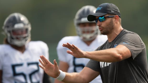 Tennessee Titans offensive line coach Keith Carter gives instruction to his players during a training camp practice at Saint Thomas Sports Park Friday, Aug. 6, 2021 in Nashville, Tenn.